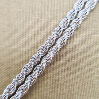 close up of solid silver rope links