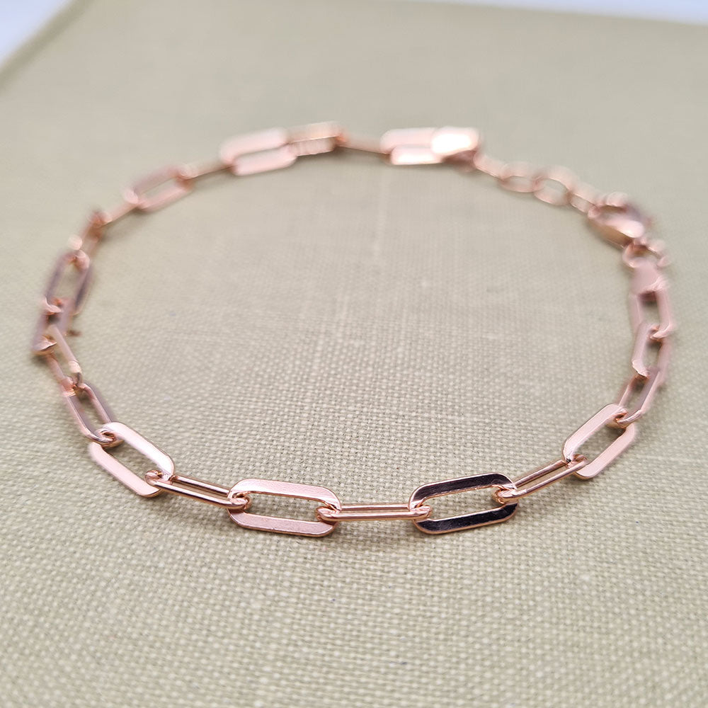close up of rose gold plated paperclip links