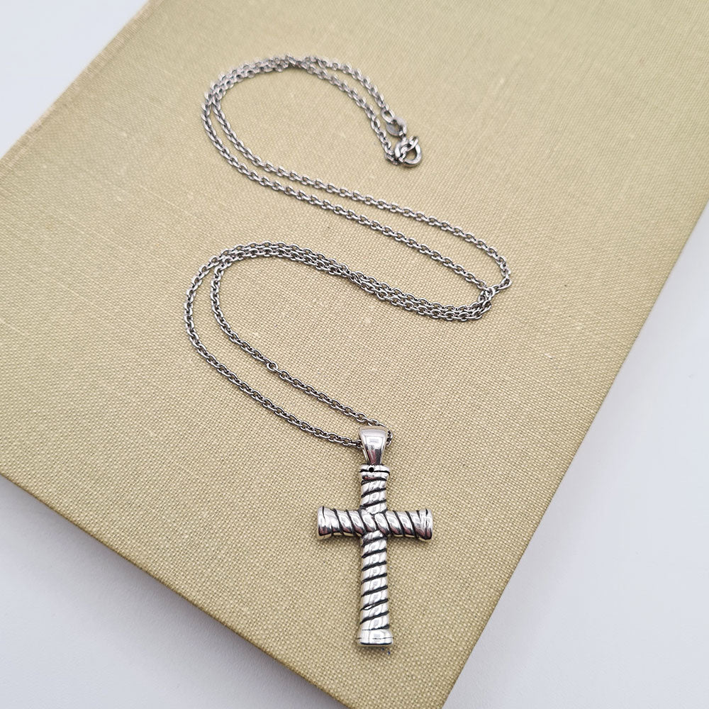 cross pendant necklace with oxidised design