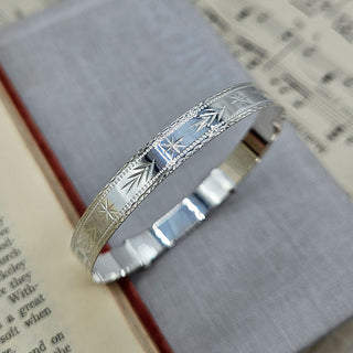 another view of pattern on ladies silver bangle