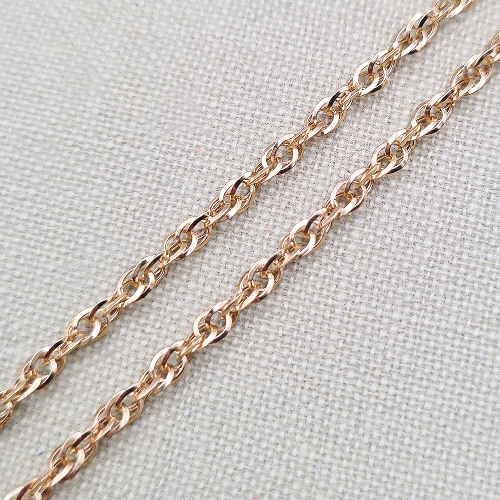 close up of gold prince of wales chain