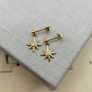 another view of star dangle earrings in 9ct gold