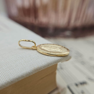 real gold miraculous pendant