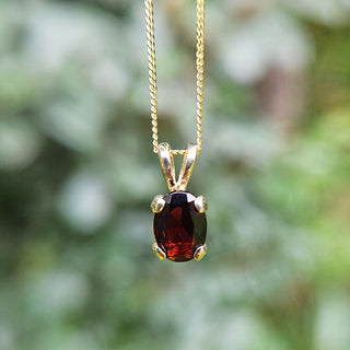 dainty gold garnet pendant and chain