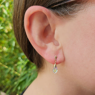 woman wearing austrian glass drop earrings