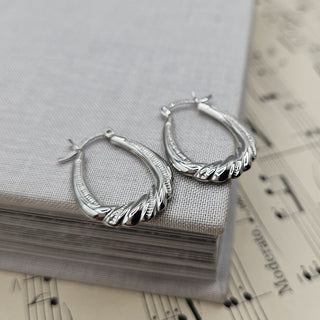 textured wrapped creoles in sterling silver