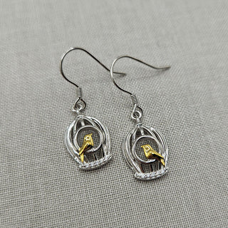 bird cage dangle earrings in silver and gold