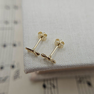 real gold bow shaped studs