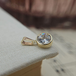 another view of clear cz pendant in 9K gold