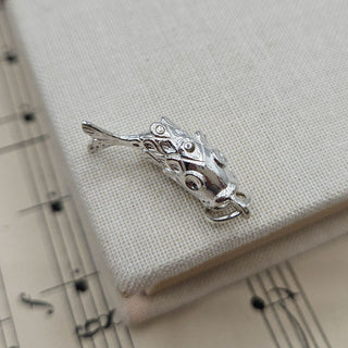 articulated fish charm on silver chain