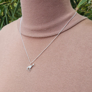 giraffe charm on chain in silver