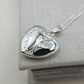 another view of silver hummingbird heart locket necklace