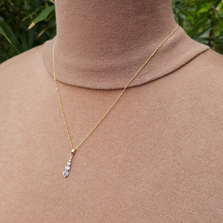 graduated cz pendant and chain in 9ct gold