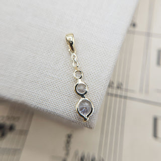 solid 9ct gold base to sparkling pendant
