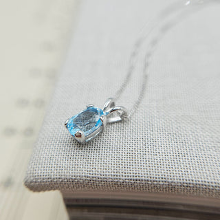 9ct white gold and topaz pendant and chain