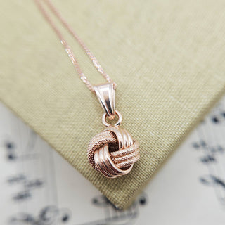 rose gold knot pendant necklace