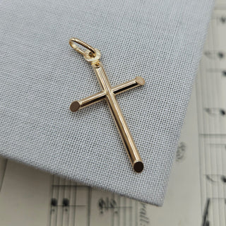 real gold cross pendant in 9k yellow
