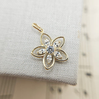 solid gold flower pendant with CZ
