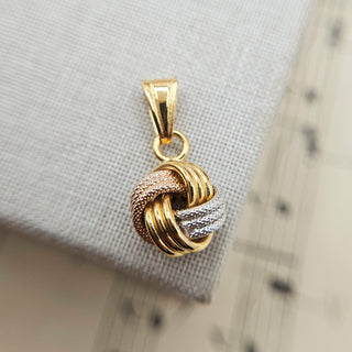 multi tone gold knot pendant