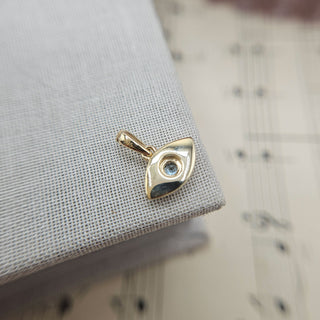 reverse of gold eye charm pendant