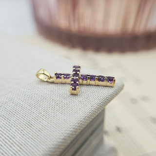 side profile of gold amethyst cross