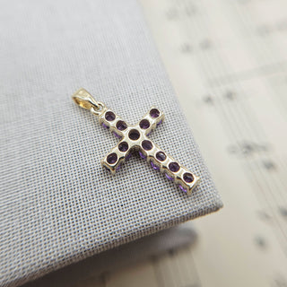 underside of gold and amethyst cross