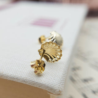 shell shaped studs in solid 9k gold