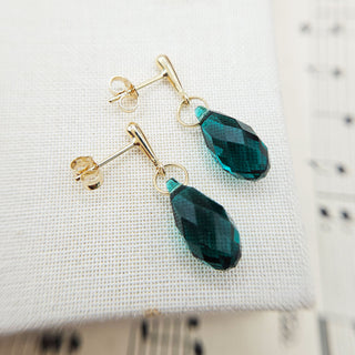 green swarovski earrings in 9k gold