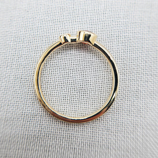 side profile of diamond and garnet ring