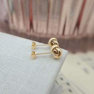 side profile of celtic knot stud earrings