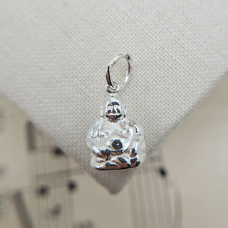 miniature Buddha charm in sterling silver