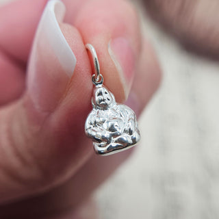 tiny silver buddha charm in sterling silver