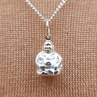 miniature Buddha charm in sterling silver