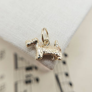 solid gold dog charm in 9K