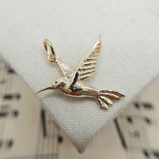 solid gold hummingbird pendant