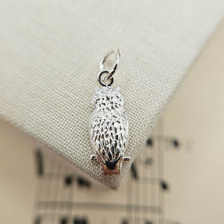 reverse side of hallmarked owl charm