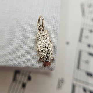reverse side of solid gold owl charm