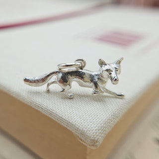 solid silver running fox charm