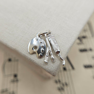 artist's charm in solid sterling silver