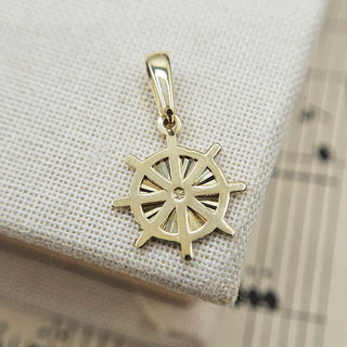 gold ship's wheel charm pendant