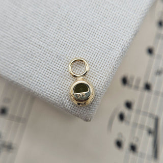 underside of perdiot charm