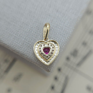 underside of 9K gold heart charm