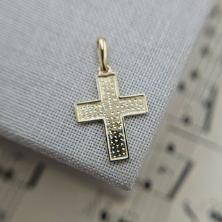 Dainty Gold Flat Starburst Cross