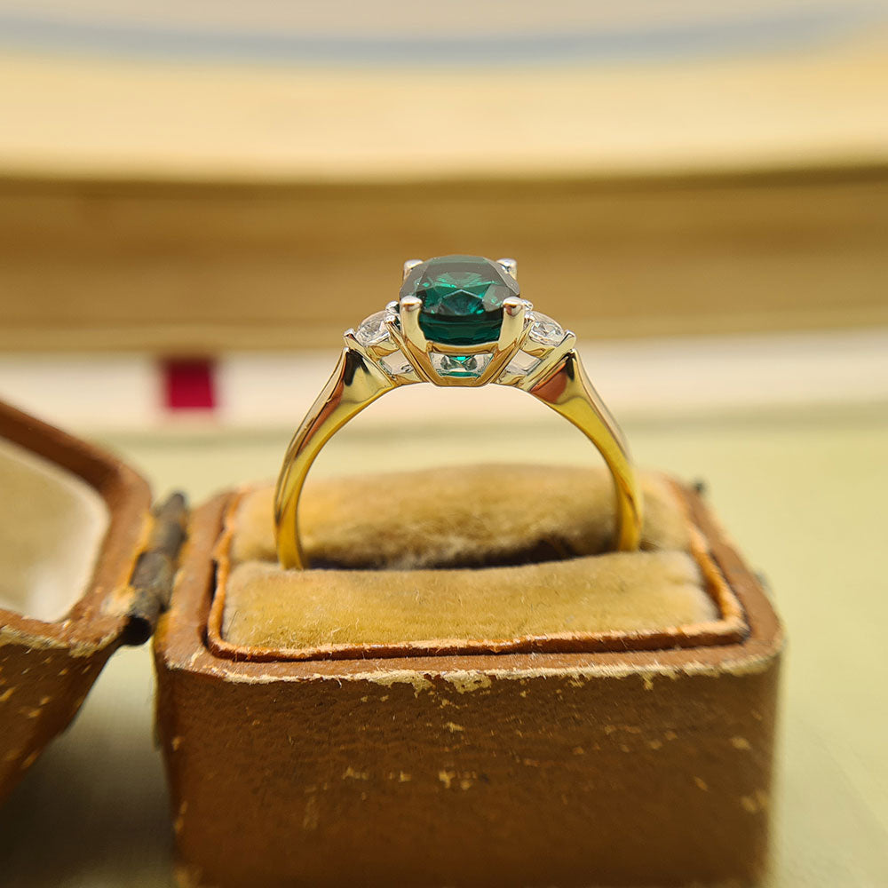 another view of the emerald engagement ring