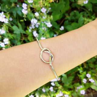 knot bangle on arm