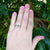 emerald diamond engagement ring ring on hand