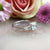 baguette shoulders on silver engagement ring