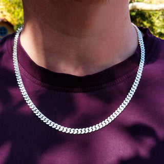 close curb chain on man's neck