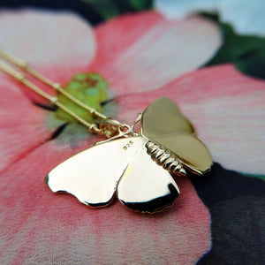 reverse of plated butterfly pendant stamped with 925