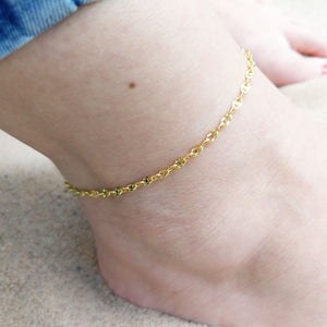 gold chain anklet being worn on ankle
